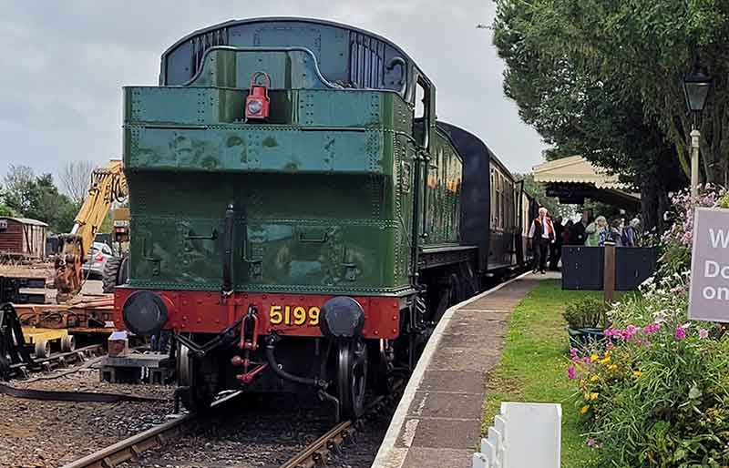 5199 steam locomotive at the platform.