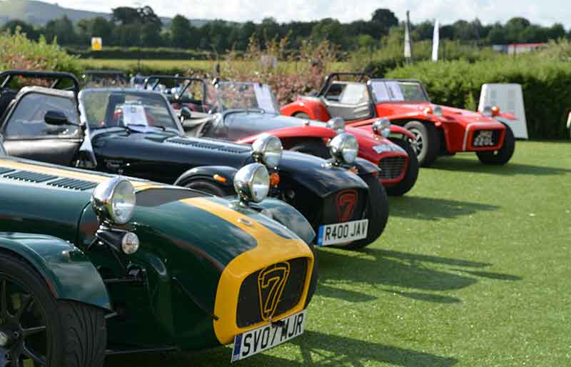 A row of classic sports cars.